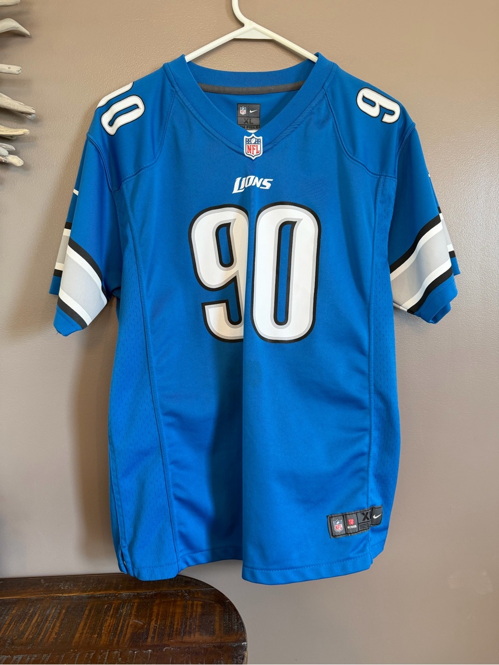 Nike Detroit Lions Ndamukong Suh jersey‎ in youth size XL.